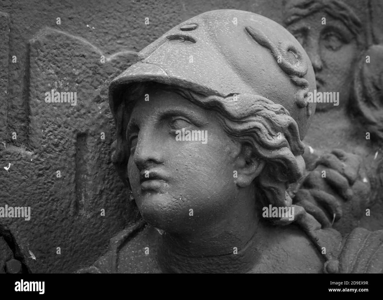 Athena the ancient Greek goddess. Woman in helmet classical sculpture Stock Photo