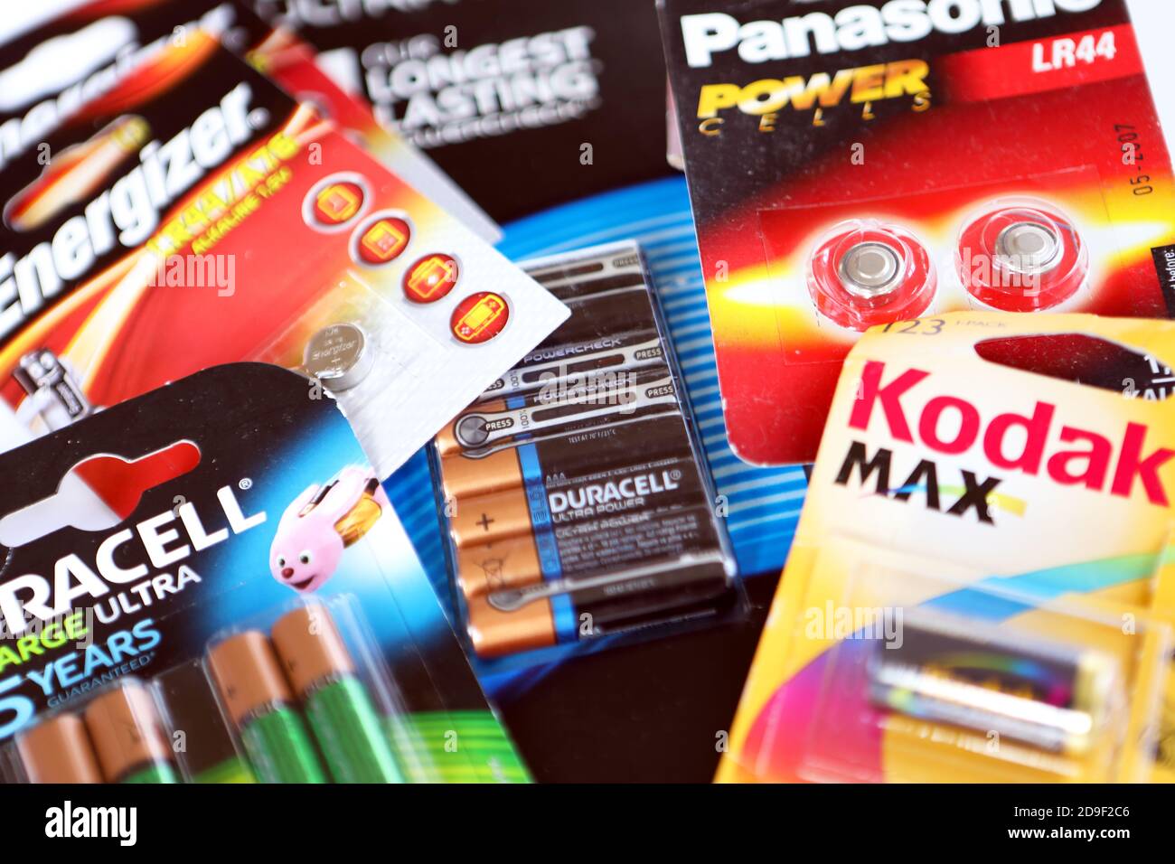 Various types and makes of batteries including Duracell, Kodak, Panasonic, Energiser Stock Photo