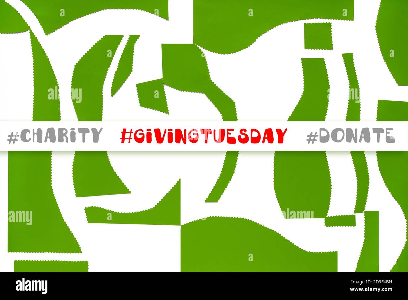 Giving Tuesday concept. Text with hashtags Givingtuesday, charity, donate on abstract background. Stock Photo