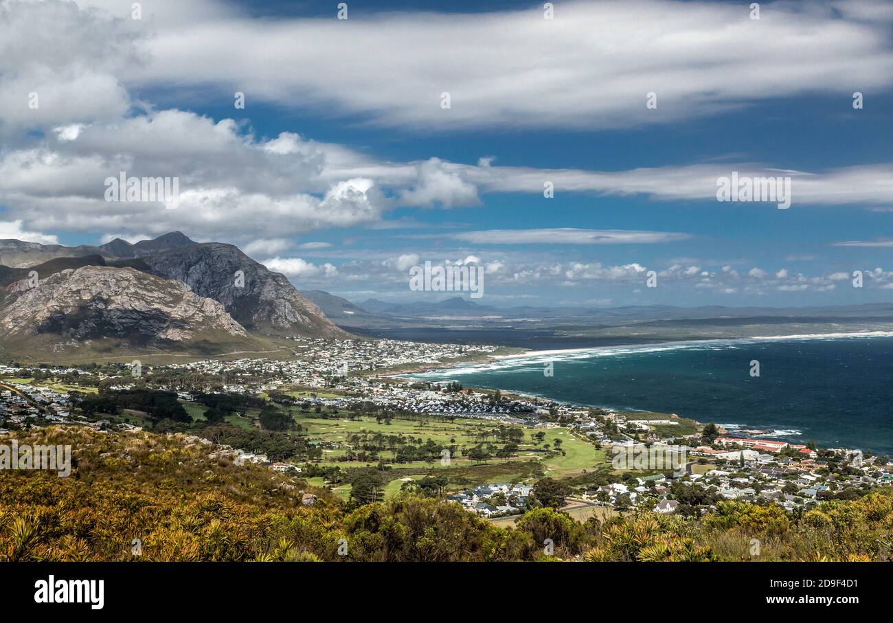 The city of Hermanus in Southern Cape Province, South Africa, seen from cliffs above the city. Hermanus on Walker Bay is a whale-watching center. Stock Photo
