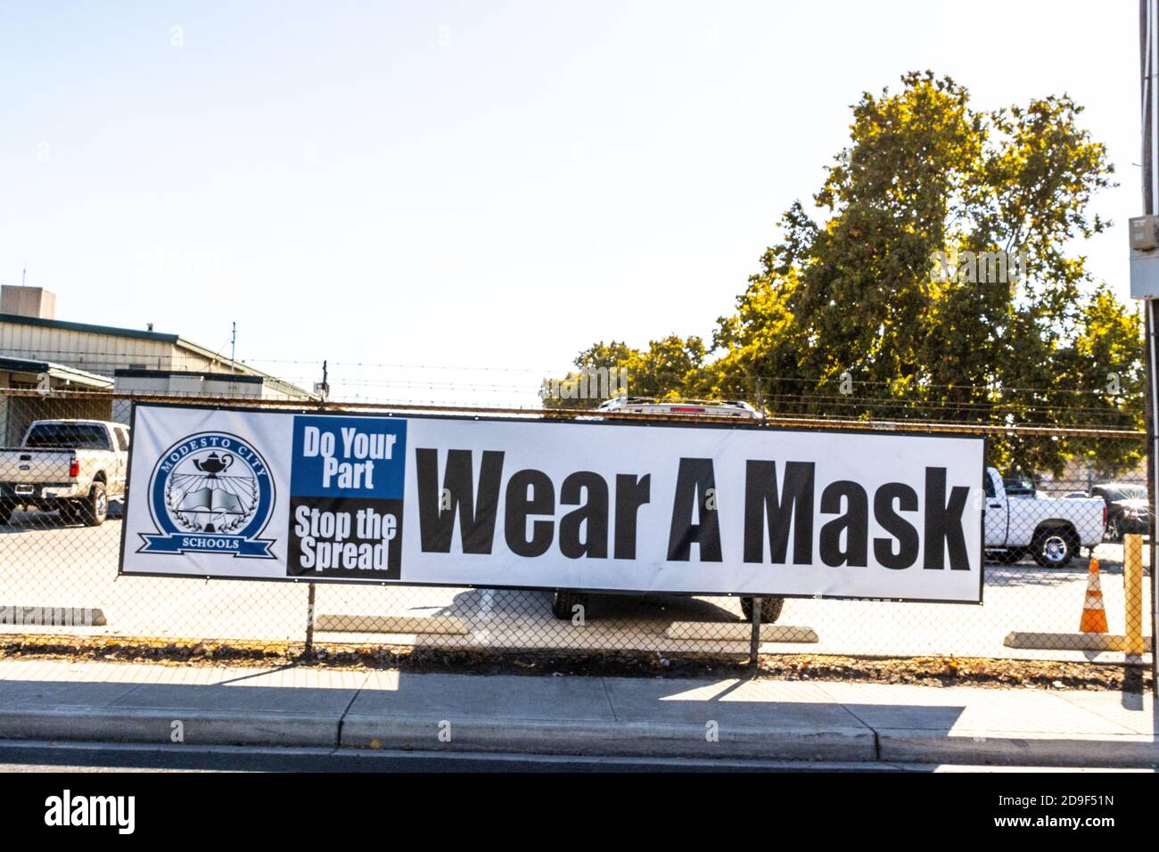 A Large Wear a Mask sign at the Modesto California City works yard in