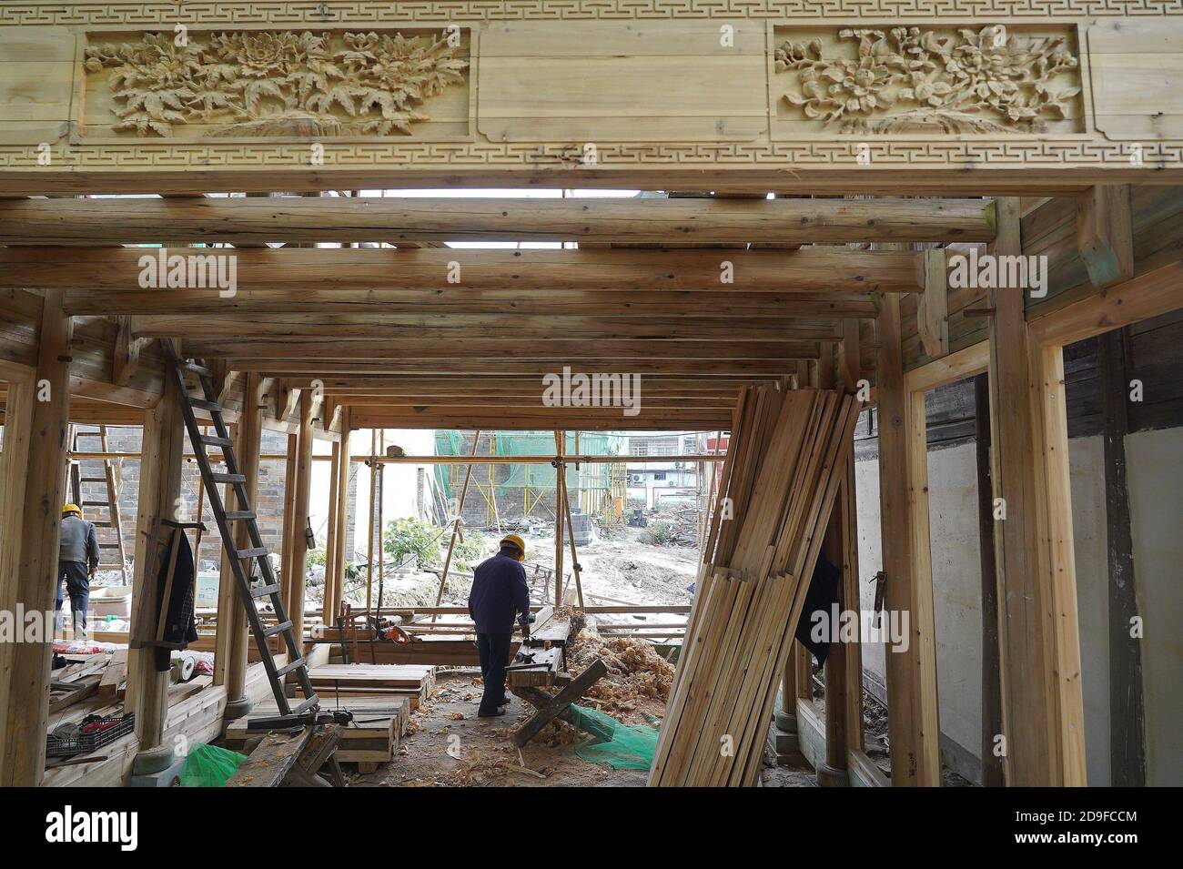 Jing'an. 4th Nov, 2020. Constructors renovate an ancient building in Jing'an County of east China's Jiangxi Province, Nov. 4, 2020. Jing'an County has a long history and has nearly 300 ancient buildings. Credit: Wan Xiang/Xinhua/Alamy Live News Stock Photo