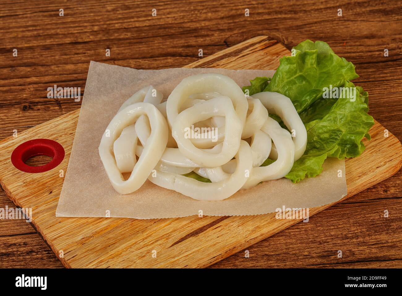 Raw squid rings ready for cooking Stock Photo - Alamy