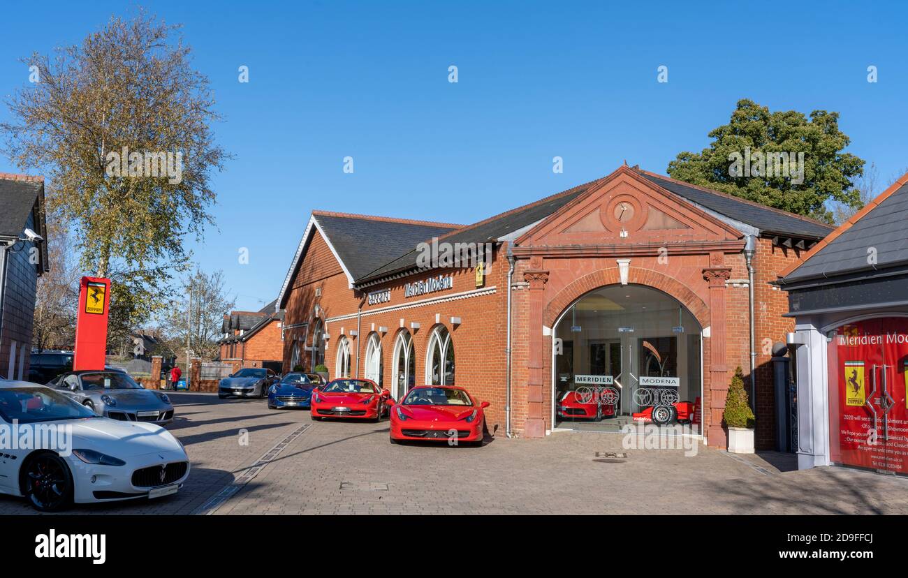 Meridien Modena Ferrari & Maserati Dealership, High Street, Lyndhurst, Hampshire, England, UK. - luxury car sales garage. Stock Photo