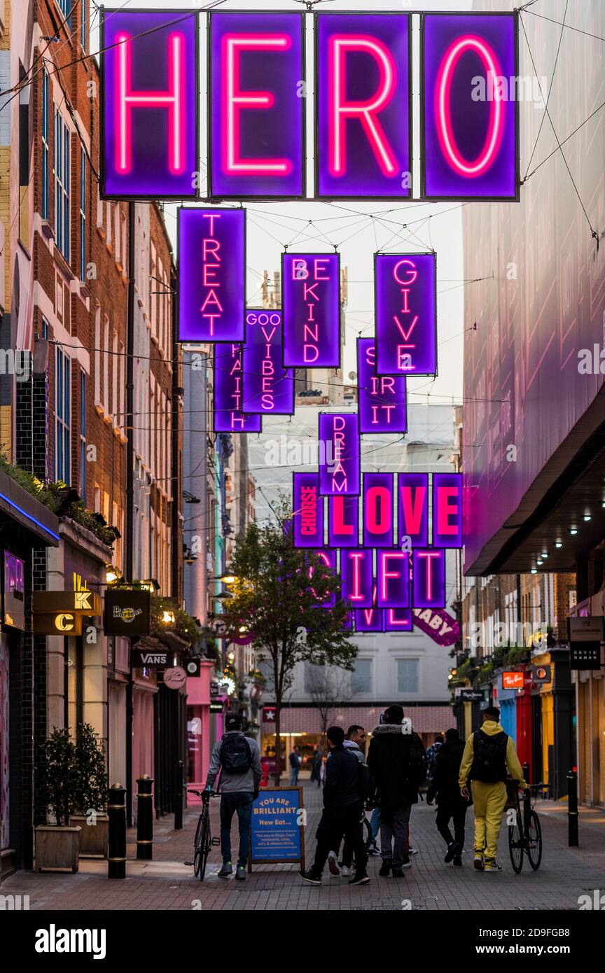 London, UK. 02nd Nov, 2020. Carnaby Street Christmas decorations are up with unlucky timing. A few people are still out, despite the new lockdown which came in to force today. Credit: Guy Bell/Alamy Live News Stock Photo