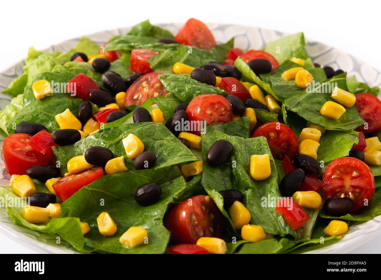 Mexican salad with black beans, corn,tomatoes,lettuce and pepper