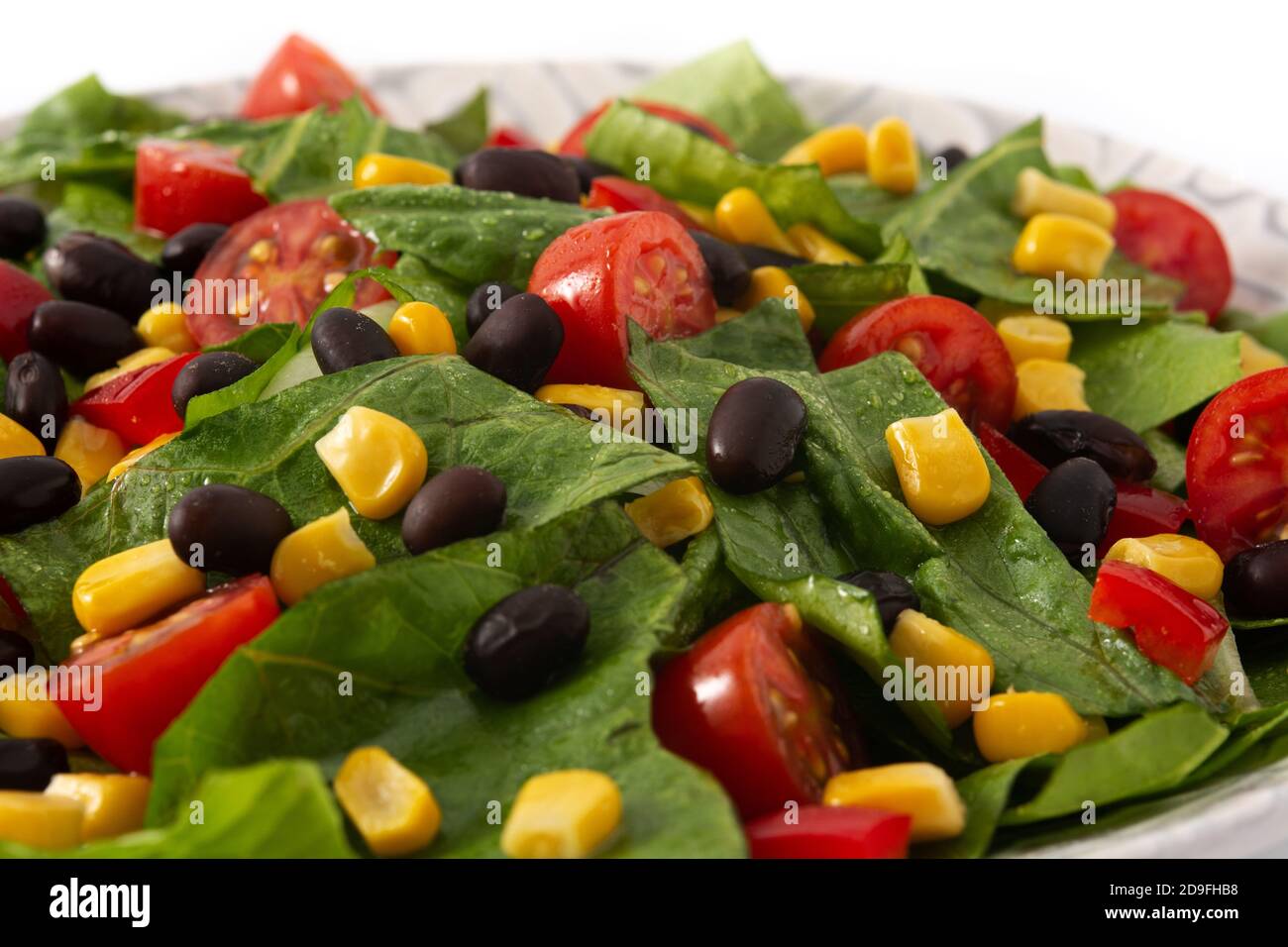 Mexican salad with black beans, corn,tomatoes,lettuce and pepper