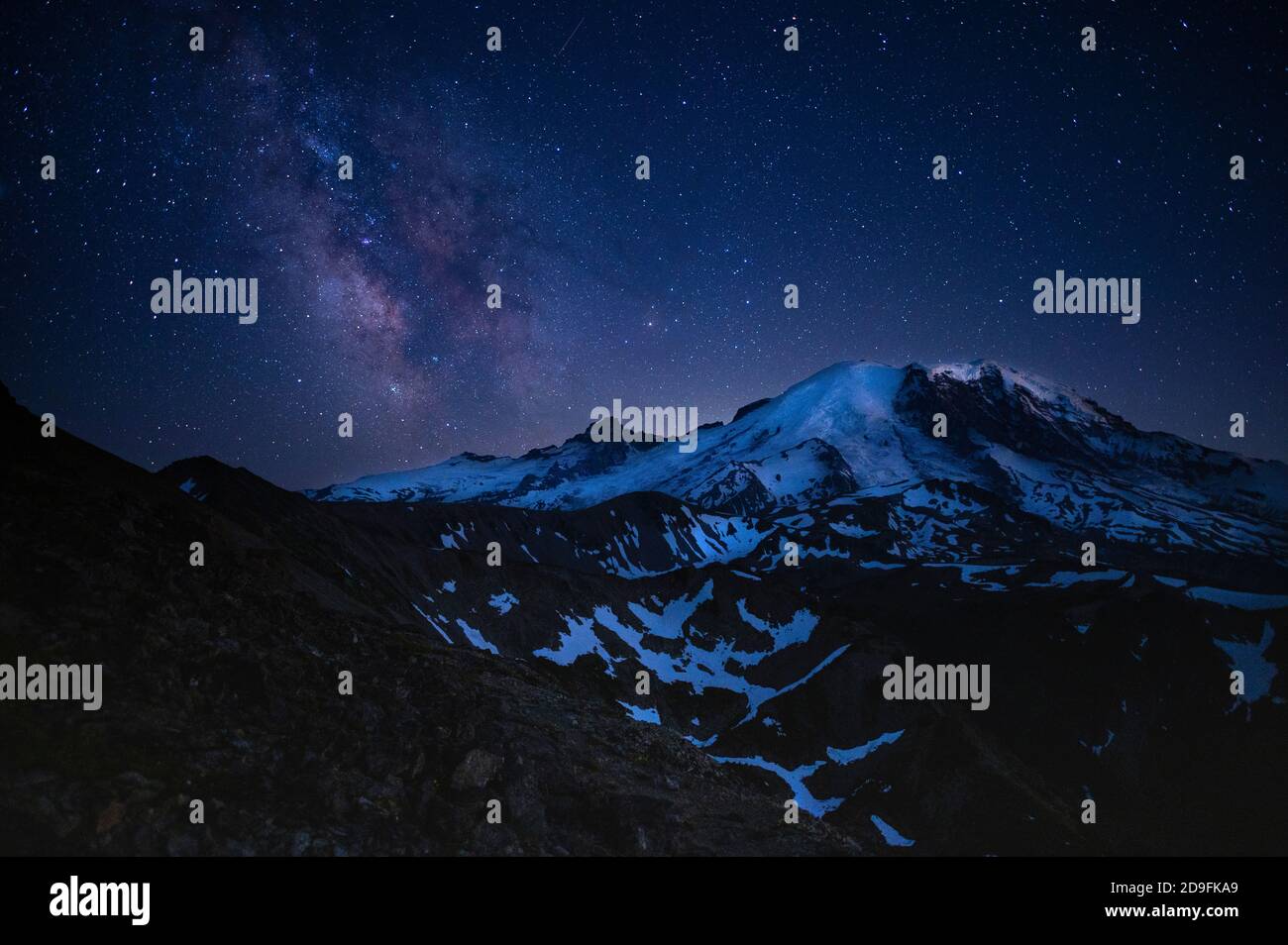 Mount Rainier in Washington state at night with the Milky Way Stock Photo