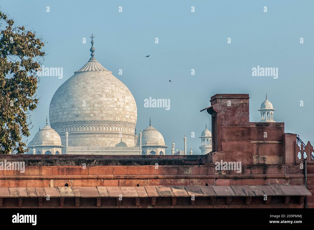 The Taj Mahal is an ivory-white marble mausoleum on the south bank of the Yamuna river in the Indian city of Agra, Uttar Pradesh. Stock Photo