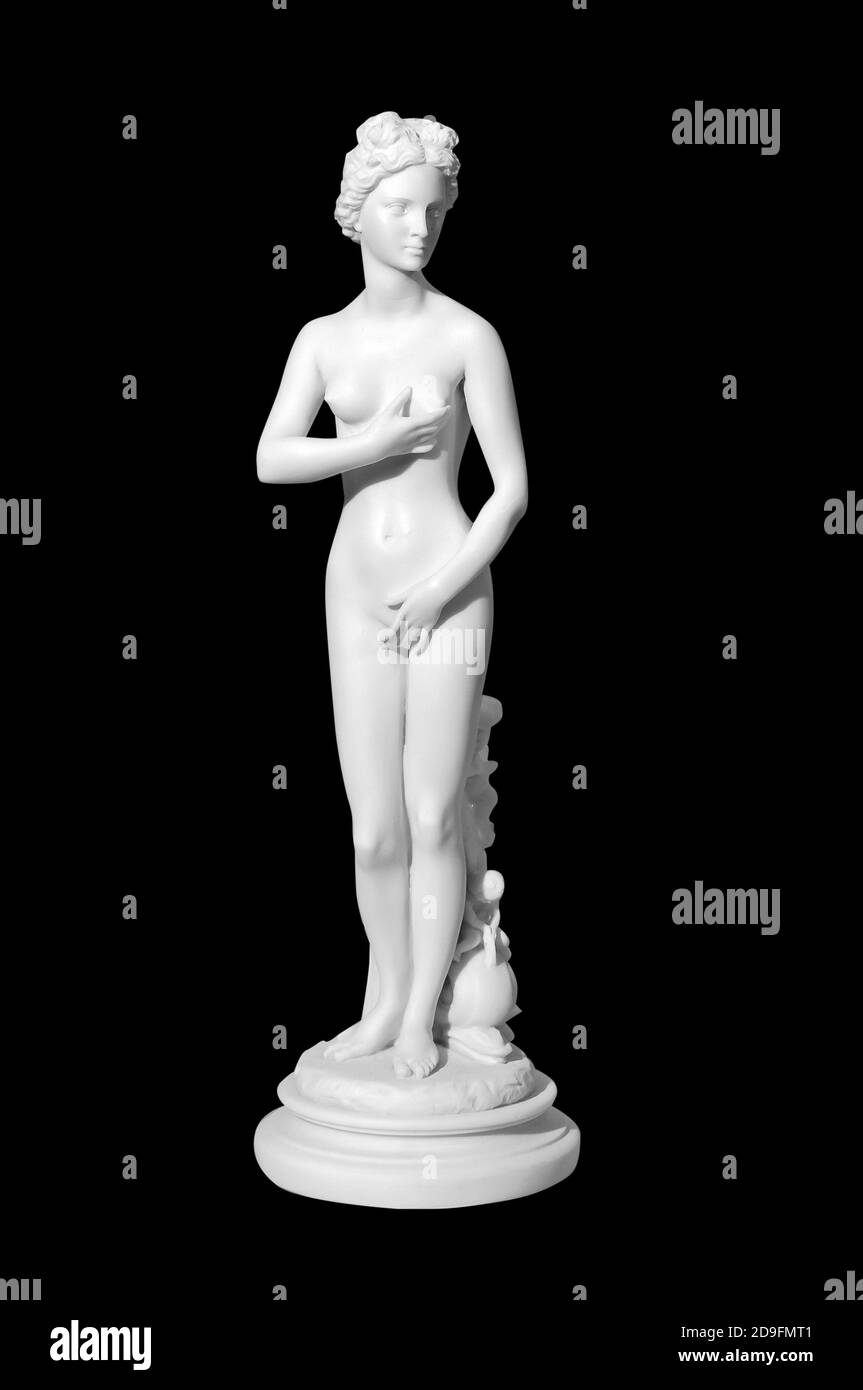 Classic white marble statue of a naked woman on a black background Stock Photo