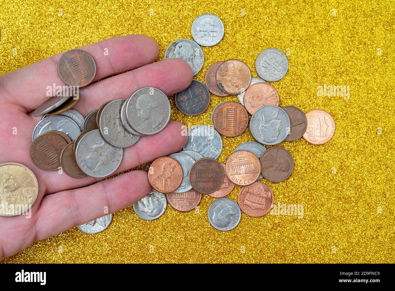 Metallic American cents. Storage and accumulation of money in the financial system of banks and loans. Stock Photo