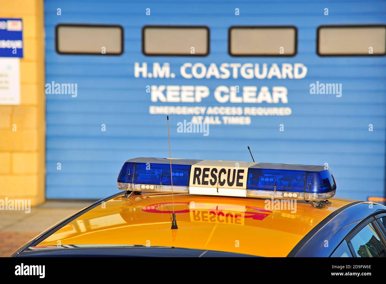 HM Coastguard rescue vehicle in front of station garage doors Stock Photo