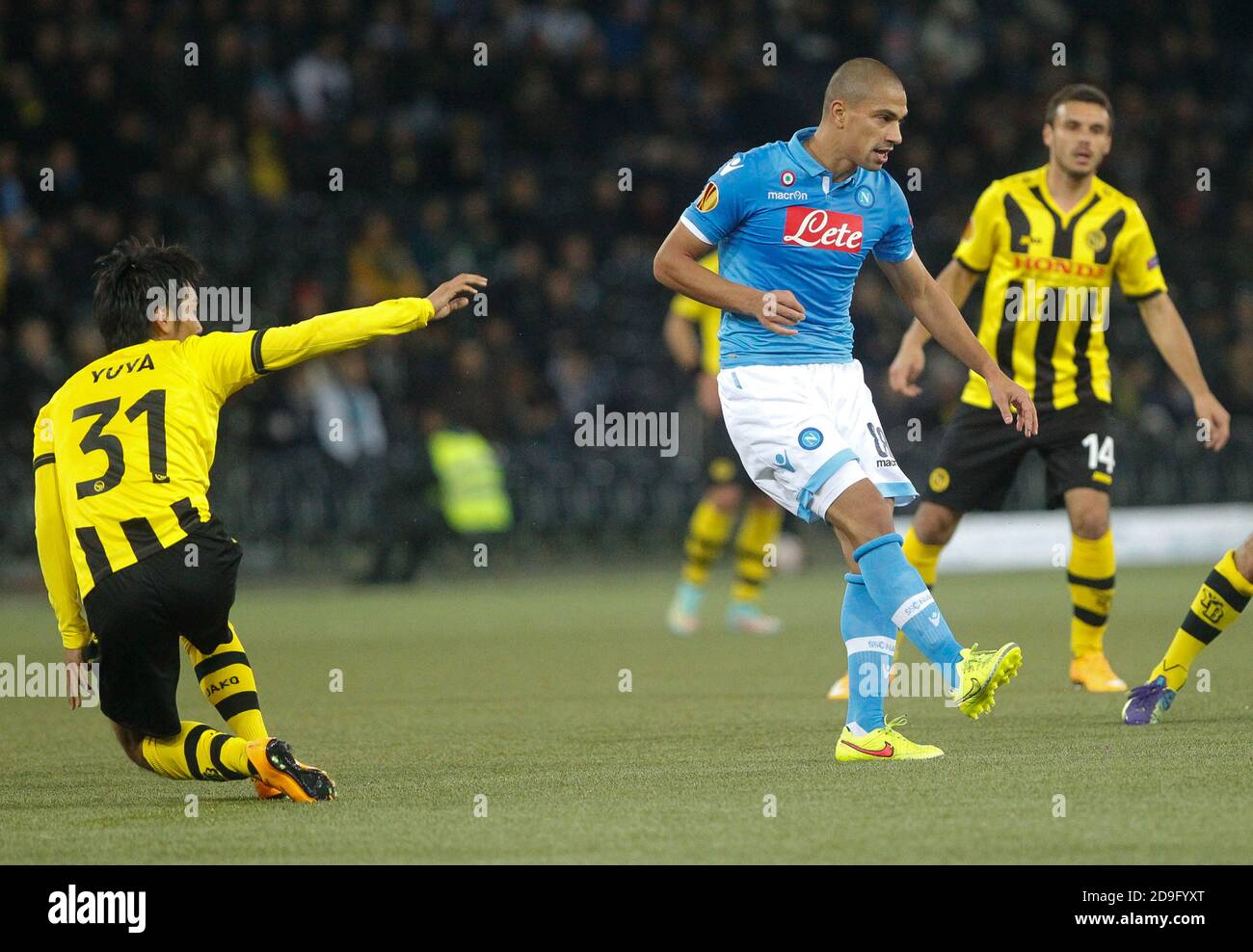 Gökhan Inler of S.S.C. Napoli and Yuya Kubo of  Young Boys Berne during the Europa League  2014 - 2015 Young Boys Berne - S.S.C. Napoli , Stade de Suisse  on October 23 2014 in Berne ,Suisse- Photo Laurent Lairys/ DPPI Stock Photo