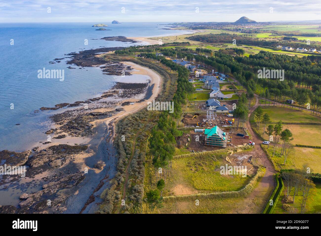 Aerial view of large modern luxury houseS built beside Firth of Forth at Archerfield Estate in East Lothian , Scotland, UK Stock Photo