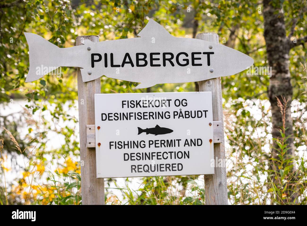 Info board about fishing permit and desinfection required on Ranaleva river, Norway Stock Photo