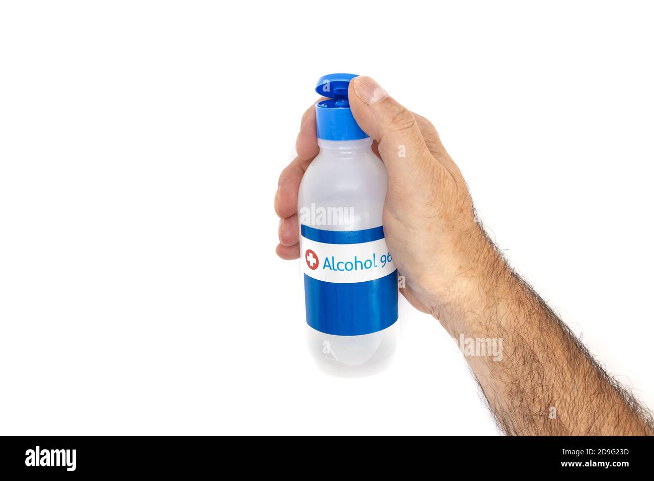 Man hand opening a bottle of disinfectant self care alcohol 96 Stock Photo