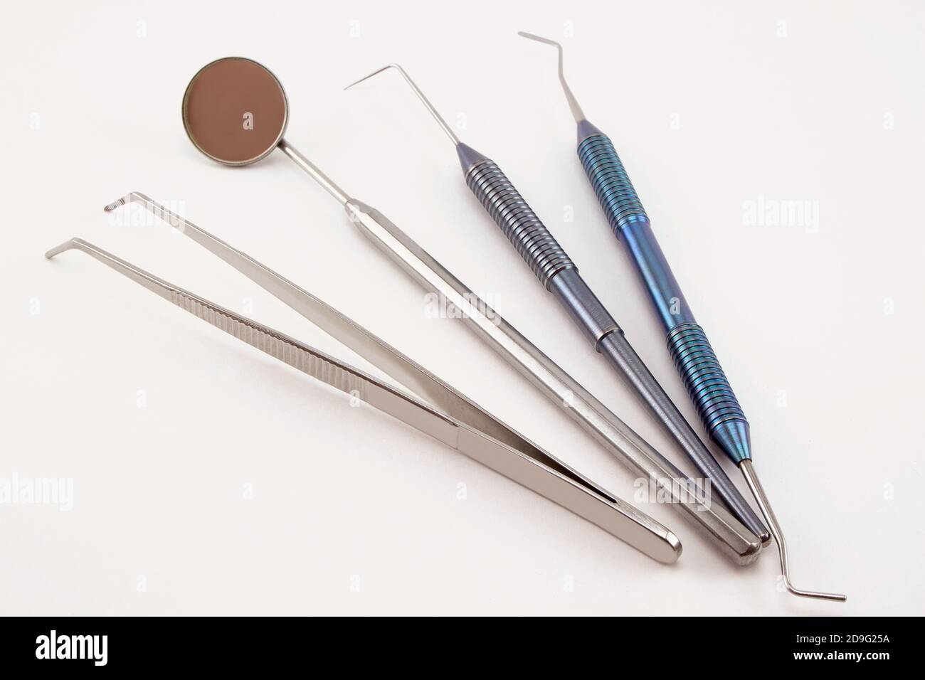 Group of tools for the diagnostics and treatment of dental diseases. Isolated on a white
