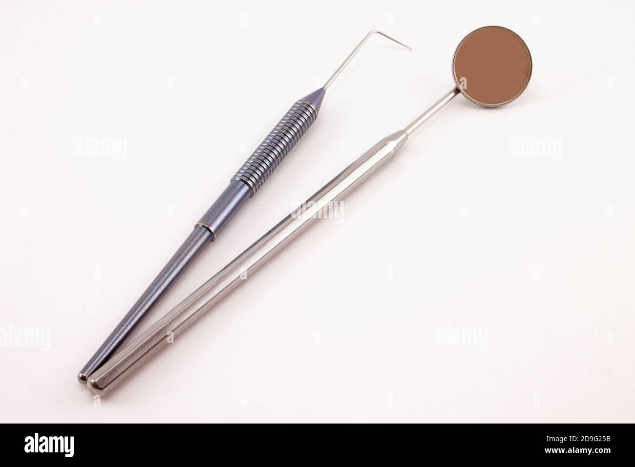 Group of dental tools for the diagnostics and treatment of dental diseases. Isolated on white