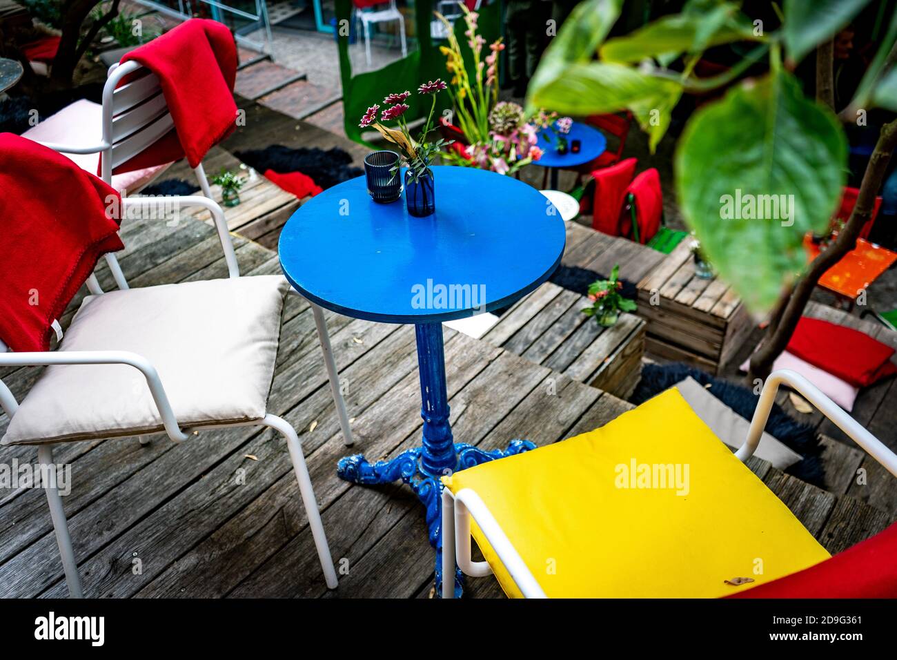 colorful tables and chairs in cafe Stock Photo