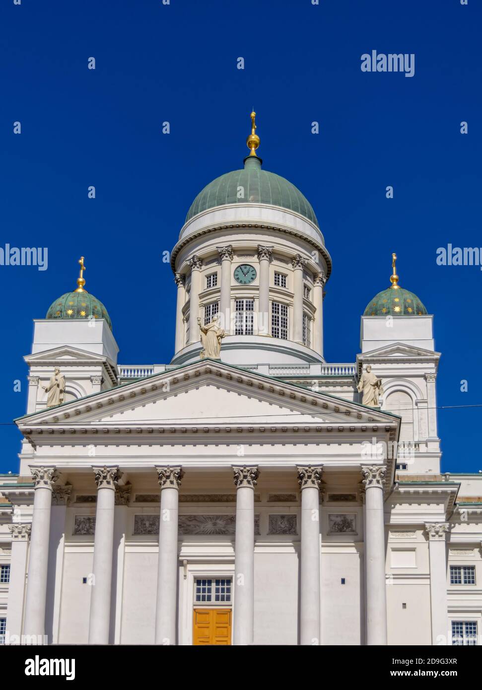Main entrance to white Helsinki Cathedral with neoclassical green dome Stock Photo