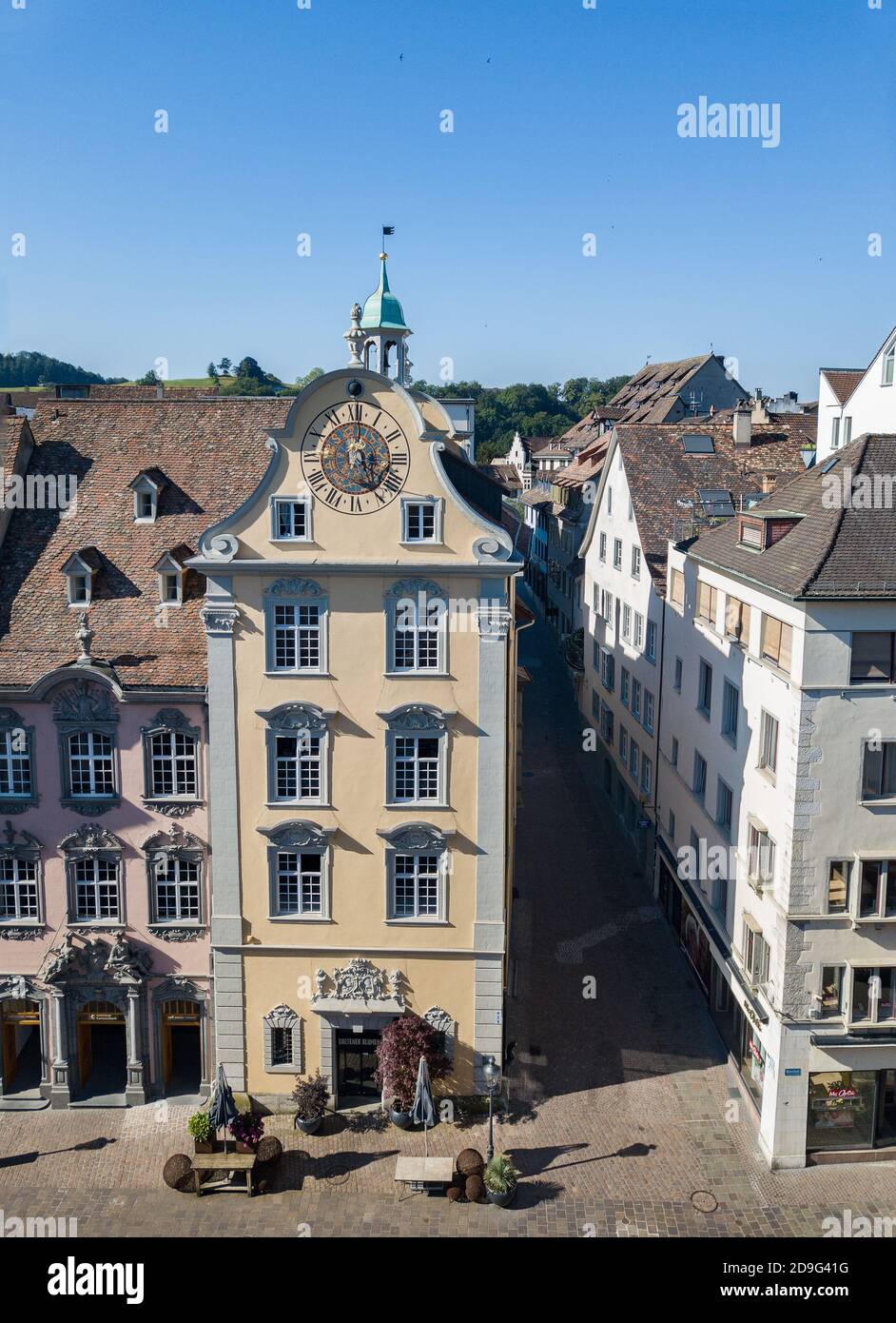 Schaffhausen, Switzerland - June 30.2019: the Fronwagplatz Square of the old Schaffhausen town center with the astronomic clock (built in 1560s) on th Stock Photo