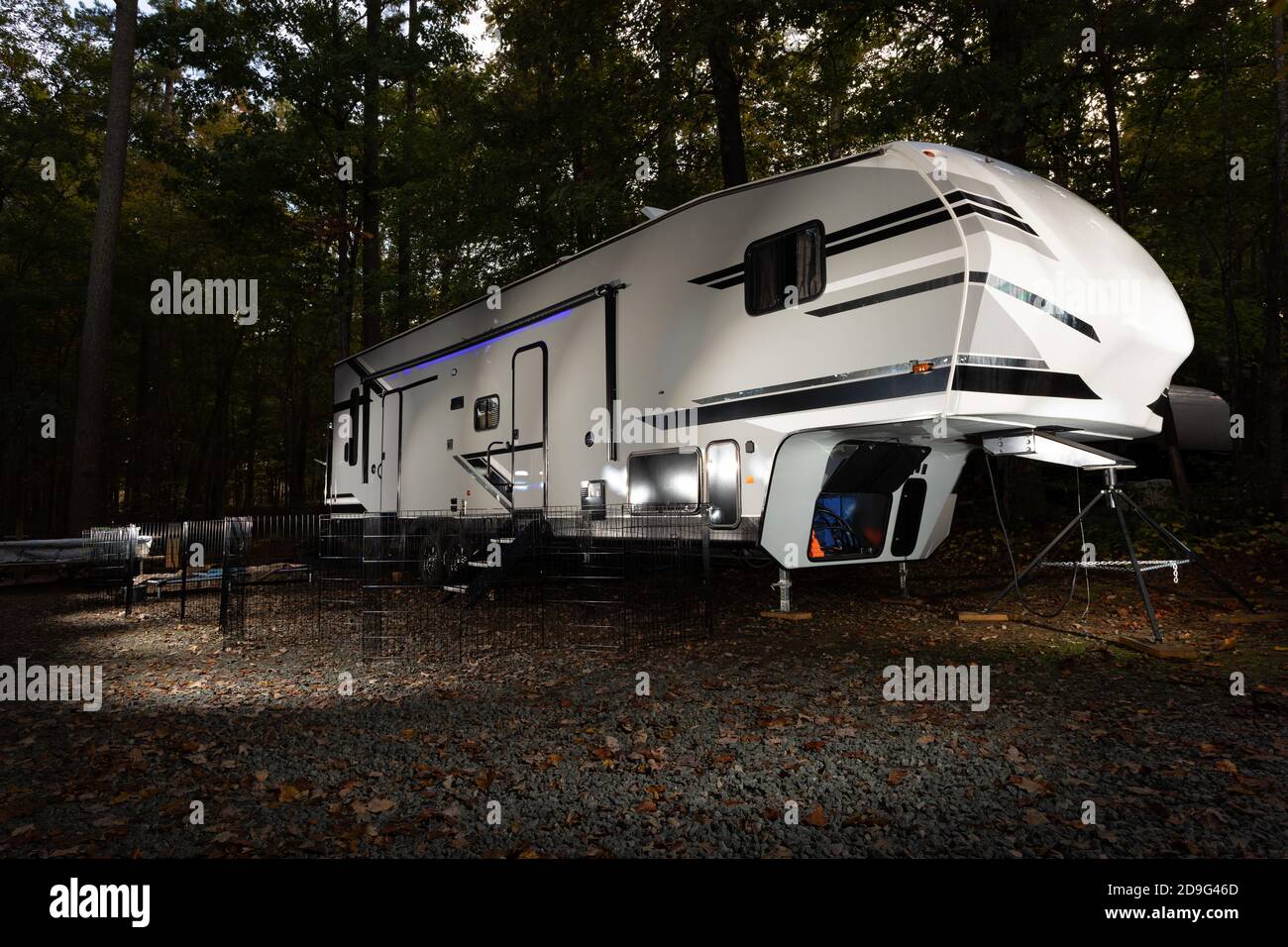Fifth wheel trailer that is a toy hauler camping in North Carolina Stock Photo Alamy