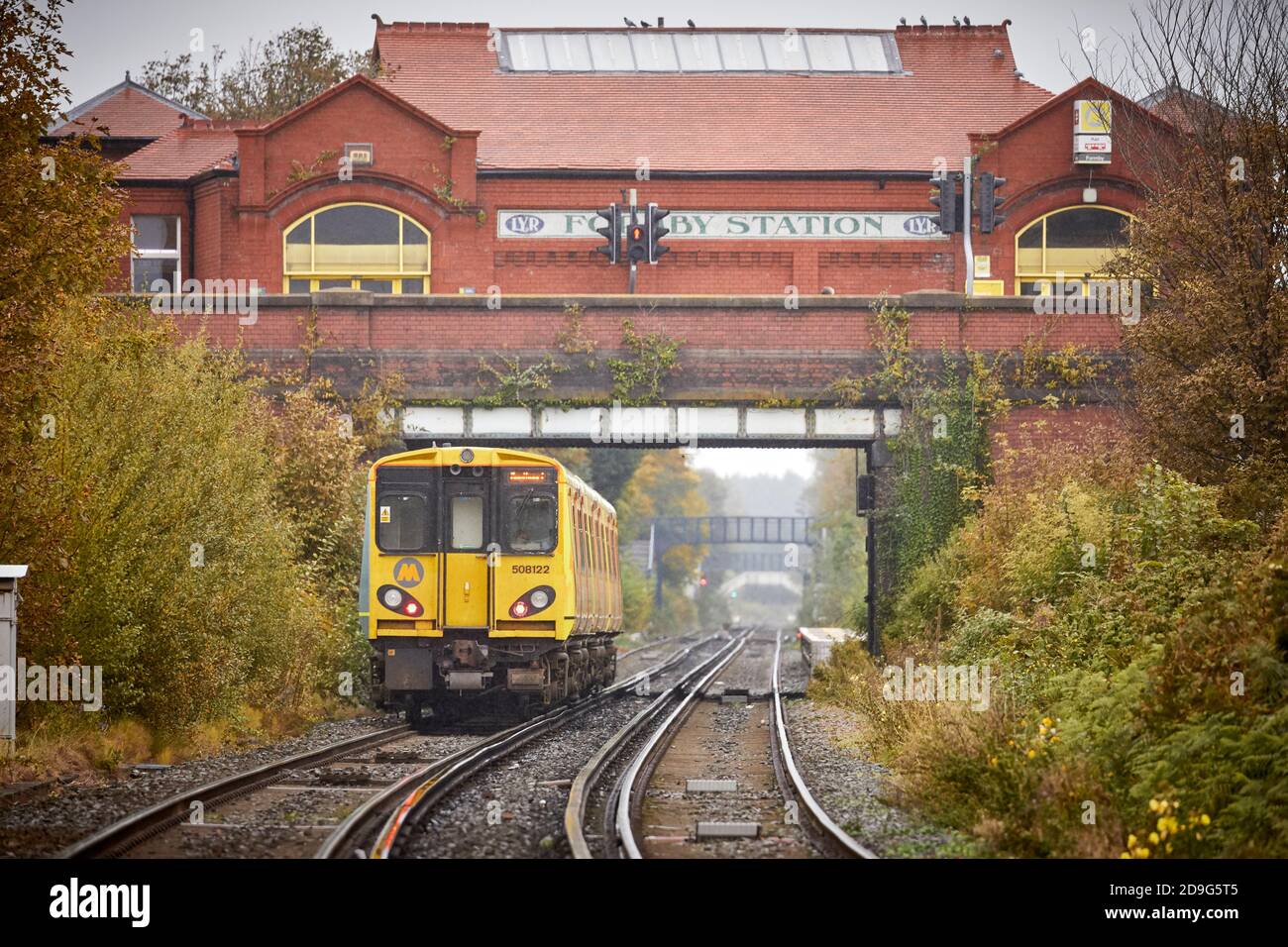 Formby Merseyside, England.  Merseyrail 3rd rail class 508 train arriving at Formby railway station Stock Photo