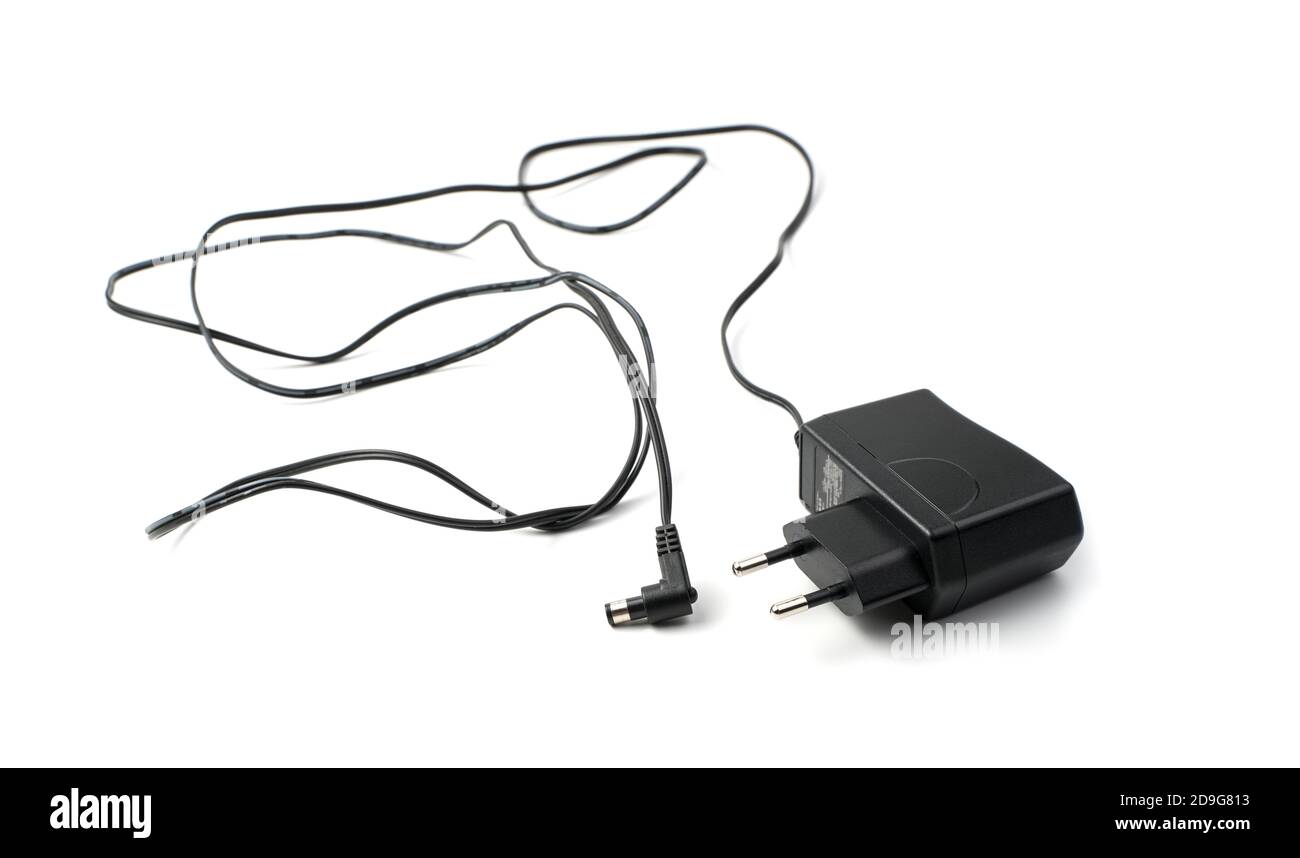 Charging device for equipment on a white background. Stock Photo