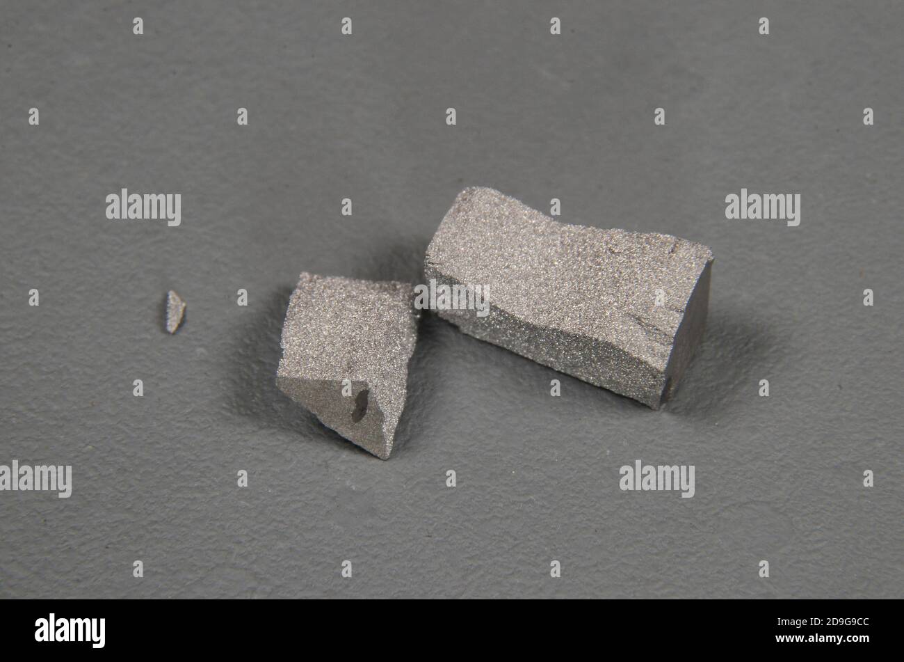 Two small pieces of Tungsten metal (W) Stock Photo