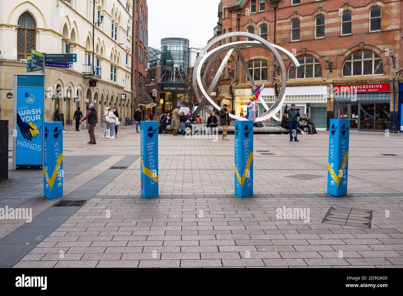 Belfast Northern Ireland Uk 5 November 2020 Signs At Arthur Square Reminding People To Keep Their Distance The Spirit Of Belfast Sculpture Is In The Background Stock Photo Alamy