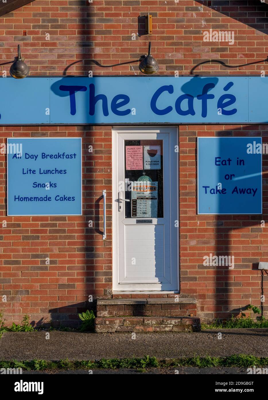a traditional greasy spoon cafeteria or cafe on an industrial estate serving full english breakfast and bacon sandwiches. Stock Photo