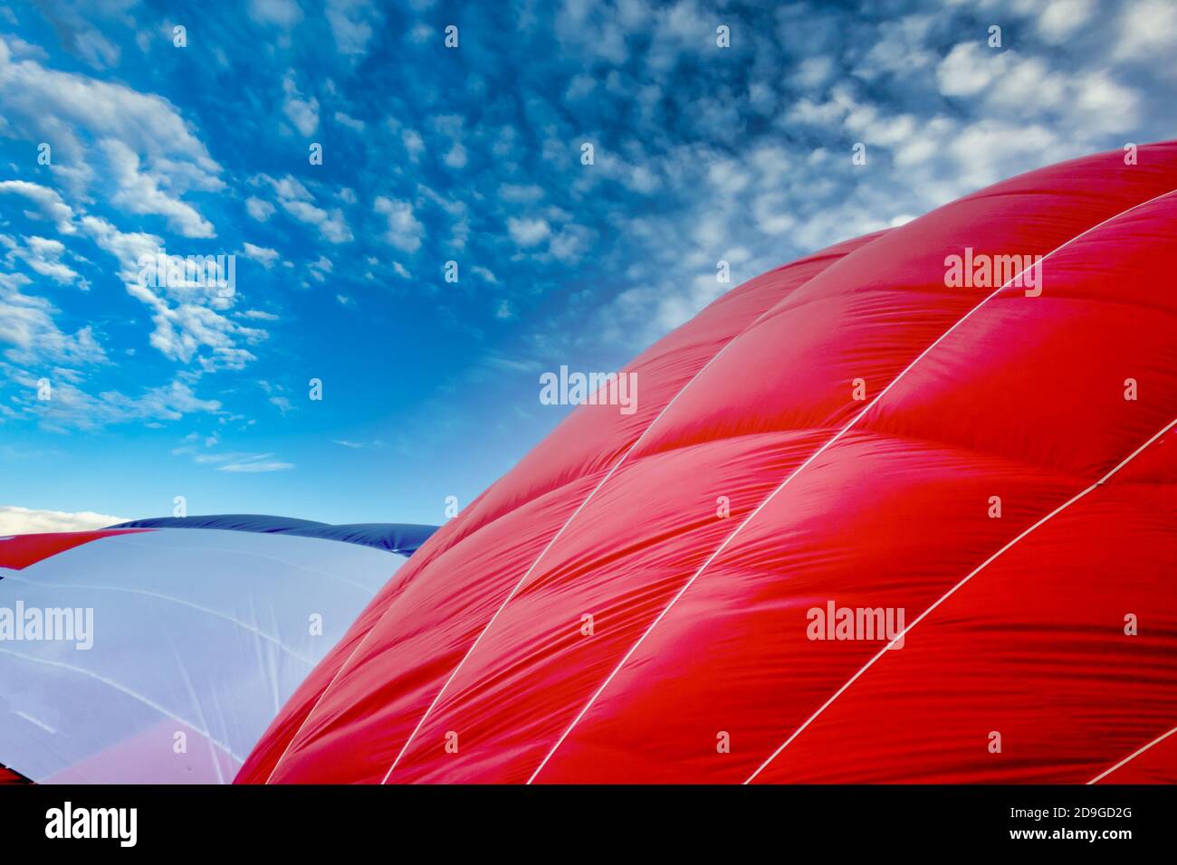 red and blue white balloon against blue sky Stock Photo