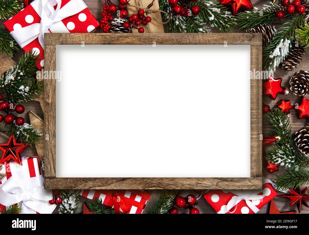 Frame mockup template. Christmas decoration gift box red stars and ornaments Stock Photo