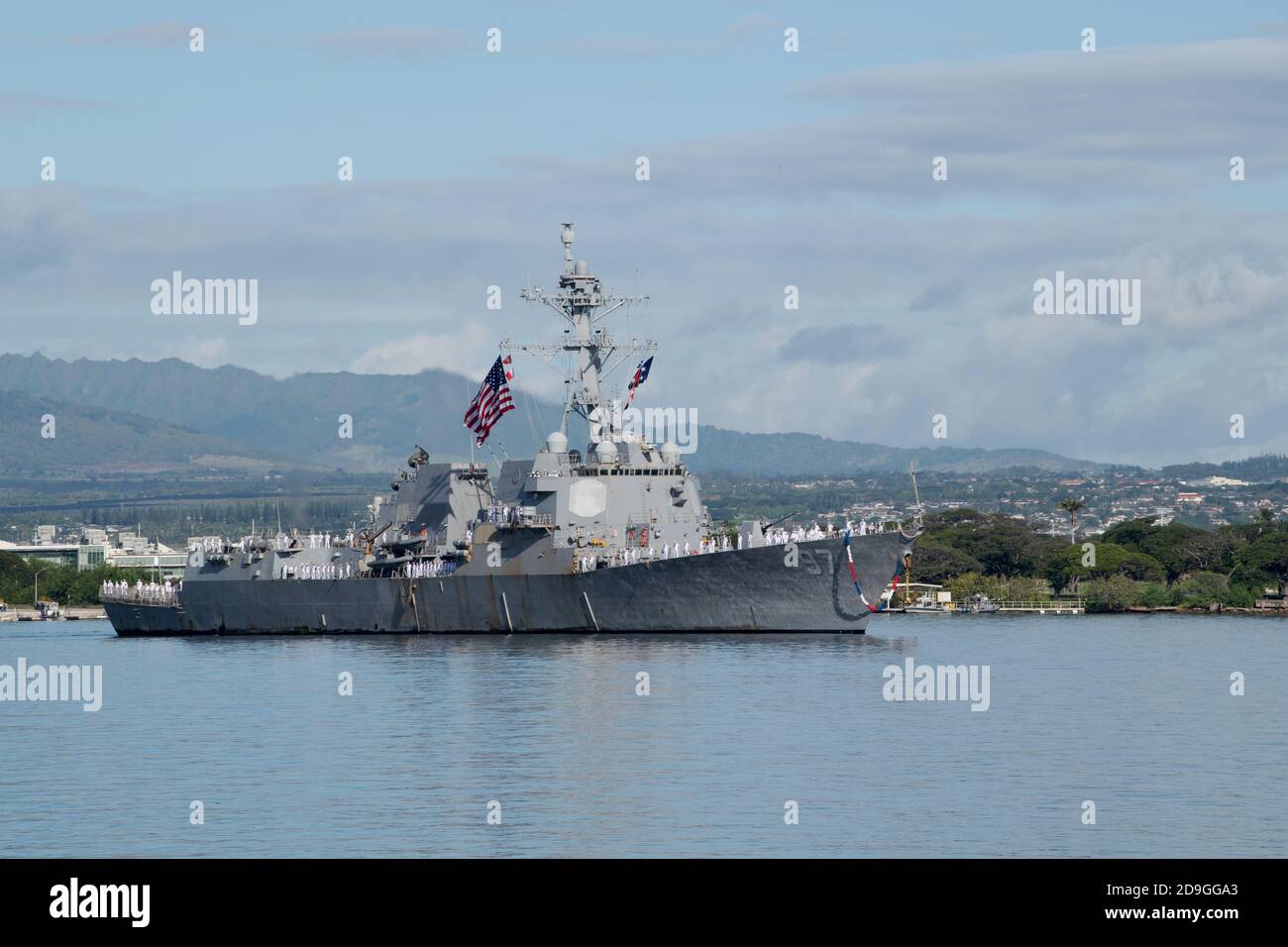 The U.S. Navy Arleigh Burke class guided-missile destroyer USS Halsey returns to homeport at Joint Base Pearl Harbor-Hickam following a seven-month deployment October 29, 2020 in Pearl Harbor, Hawaii. Stock Photo