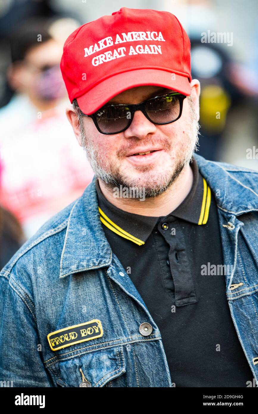 Philadelphia, USA. 5th November, 2020. A man wearing a Proud Boys patch and wearing a MAGA hat at the Philadelphia Convention Center. Two days after the Presidential election, Donald Trump sued several states to stop counting legally cast ballots in States that lean towards Joe Biden. Credit: Chris Baker Evens. Stock Photo