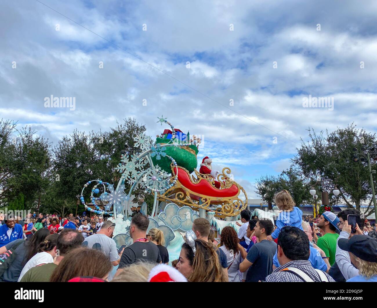 Orlando,FL/USA-12/28/19: The Christmas parade starring Santa Claus at the Magic Kingdom theme park at Disney World. Stock Photo
