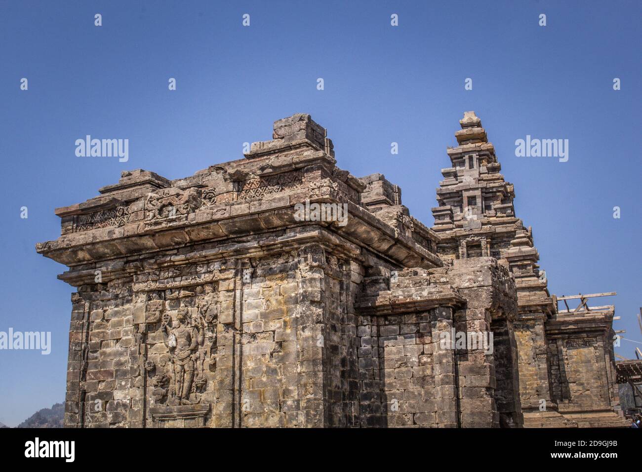 Ruins of ancient stone temple Candi Arjuna in Central Java, Indonesia Stock Photo