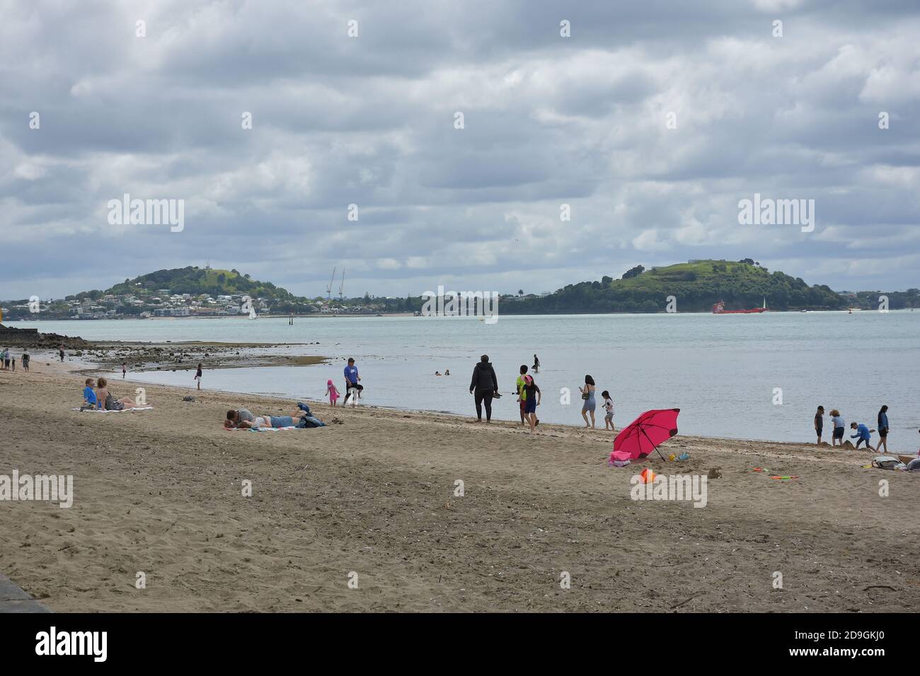 AUCKLAND, NEW ZEALAND - Nov 01, 2020: View of people on Mission Bay Beach Stock Photo