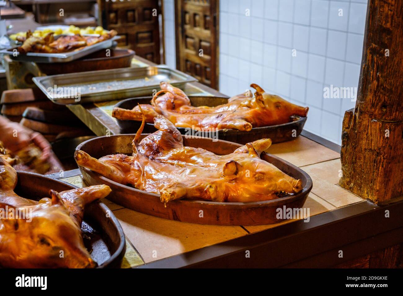 Roasted suckling pig served traditionally at a Spanish restaurant Stock Photo