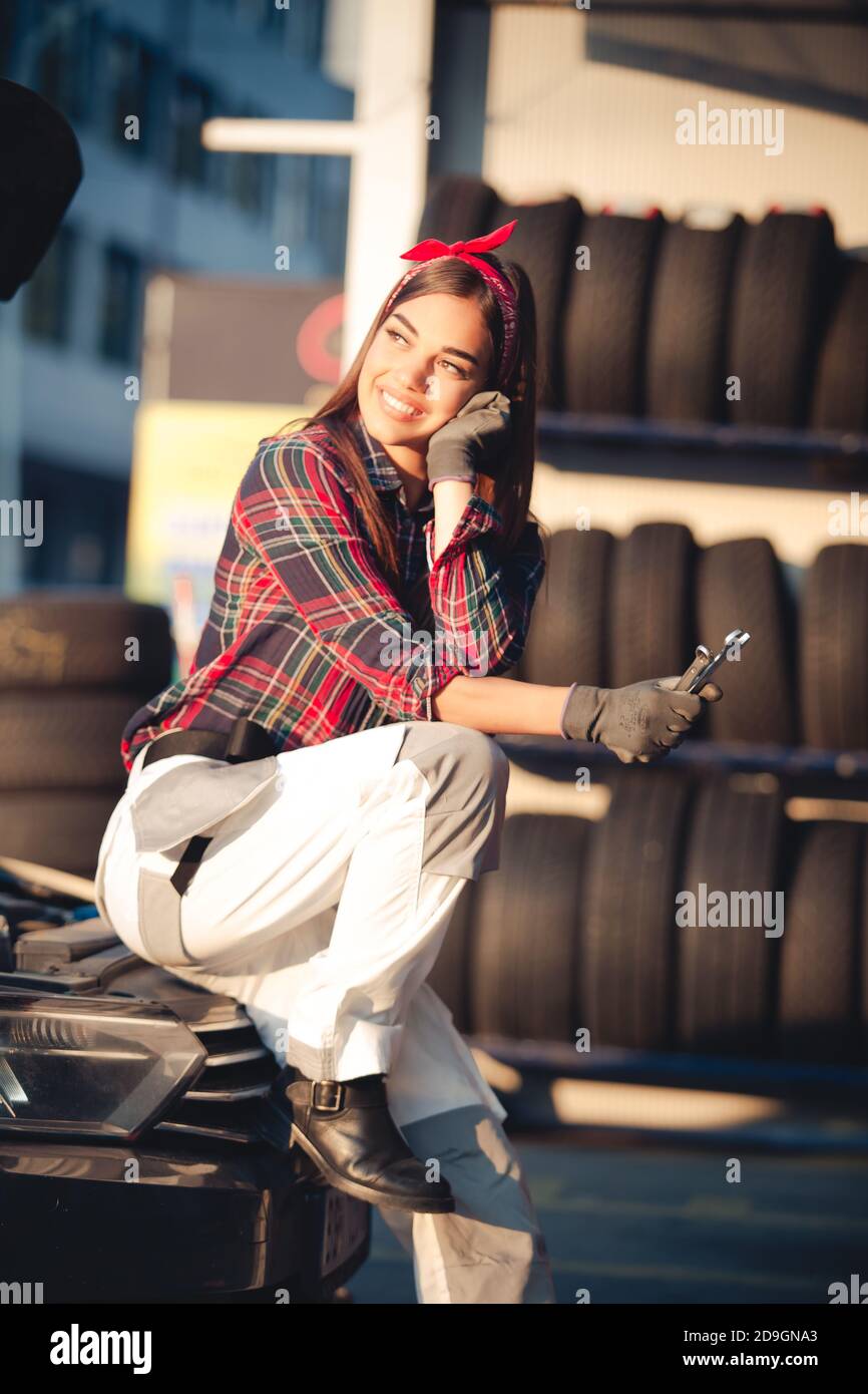 Girl mechanic ar repair shop Stock Photo