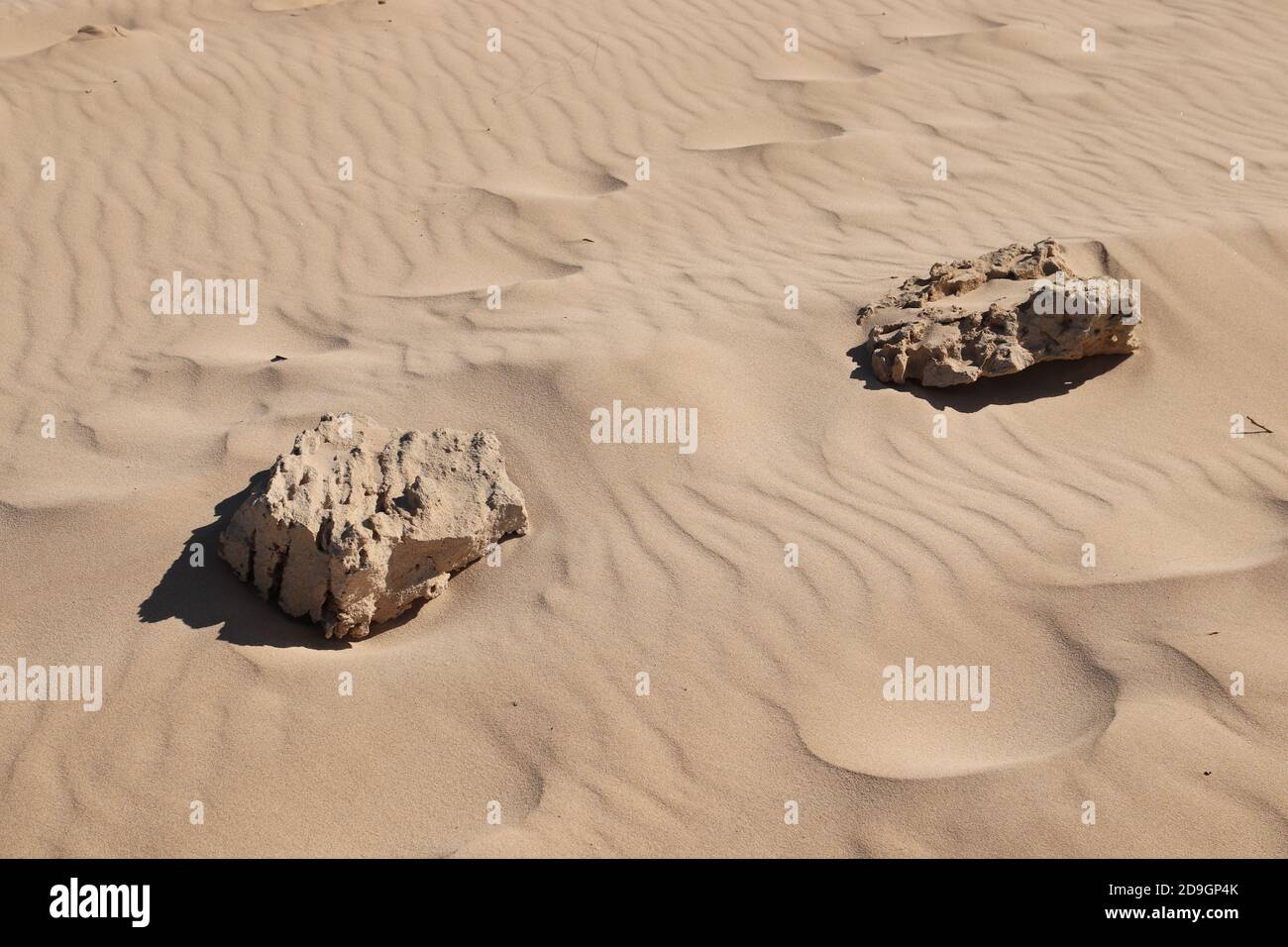 Rock formations in a dry desert Stock Photo - Alamy