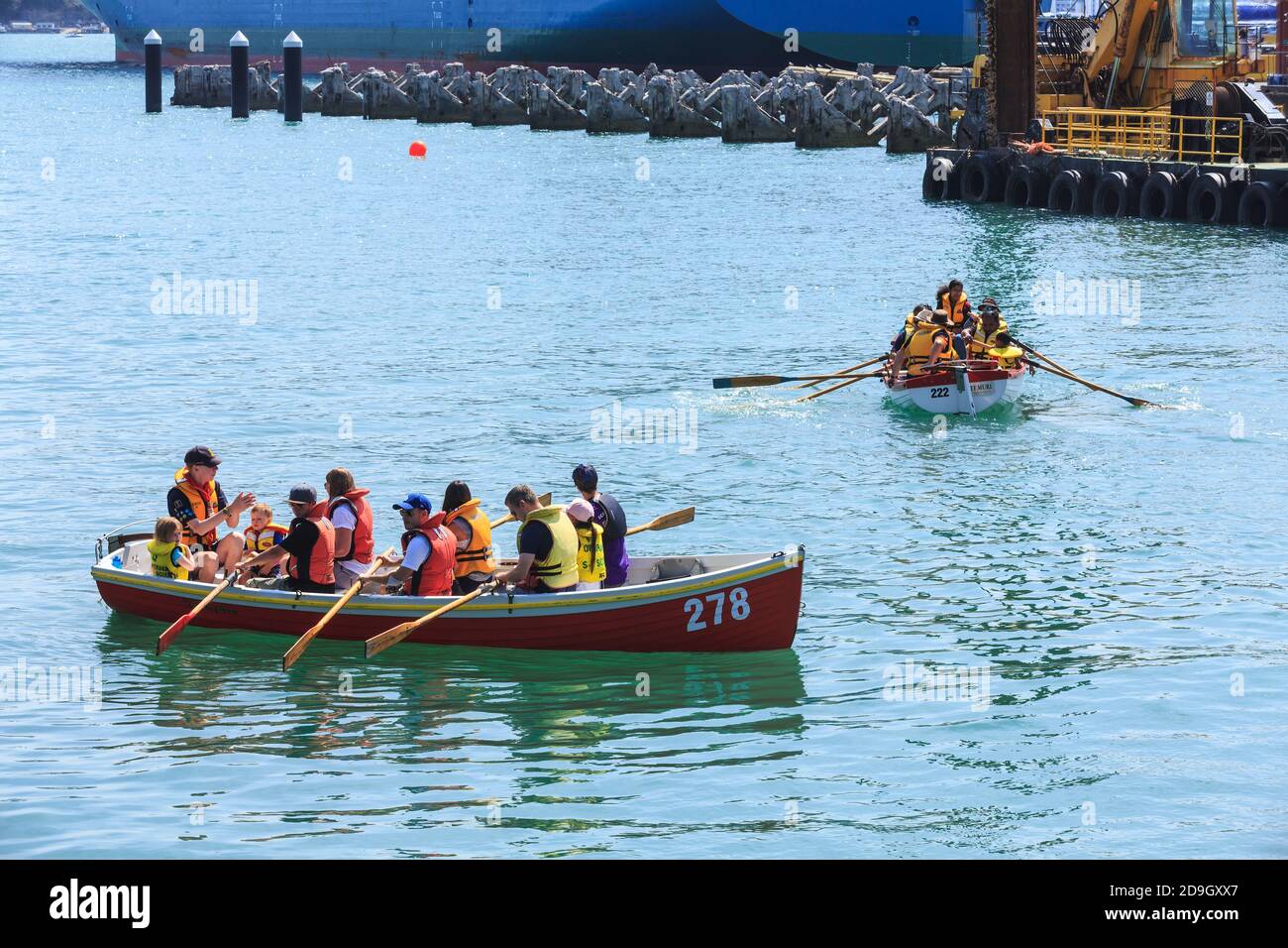Sea Scouts practicing with prowboats and oars in Waitemata Harbour, Auckland, New Zealand Stock Photo