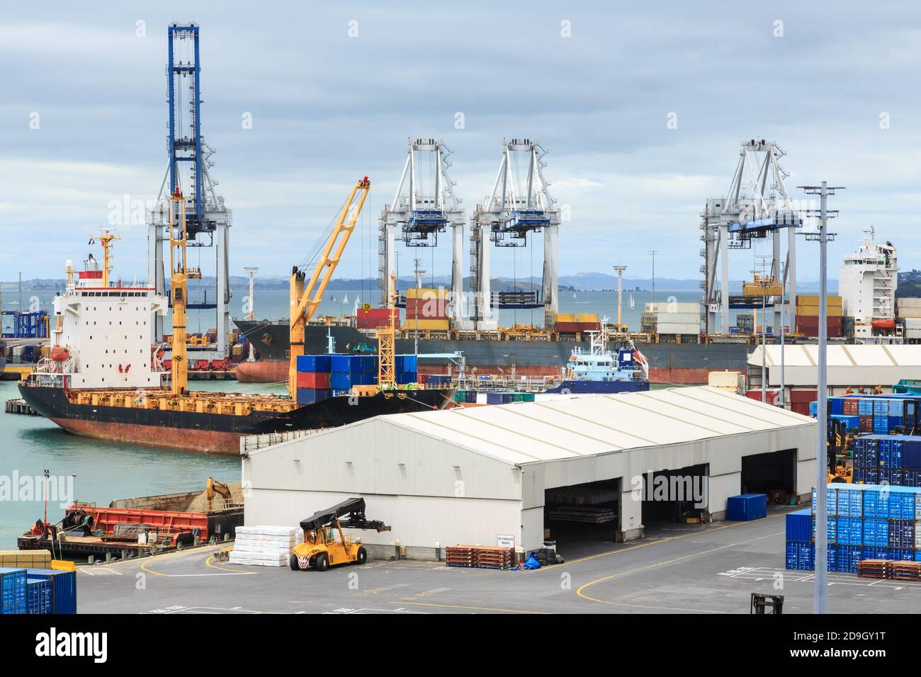 The Port of Auckland, New Zealand. A view of the massive cranes on the