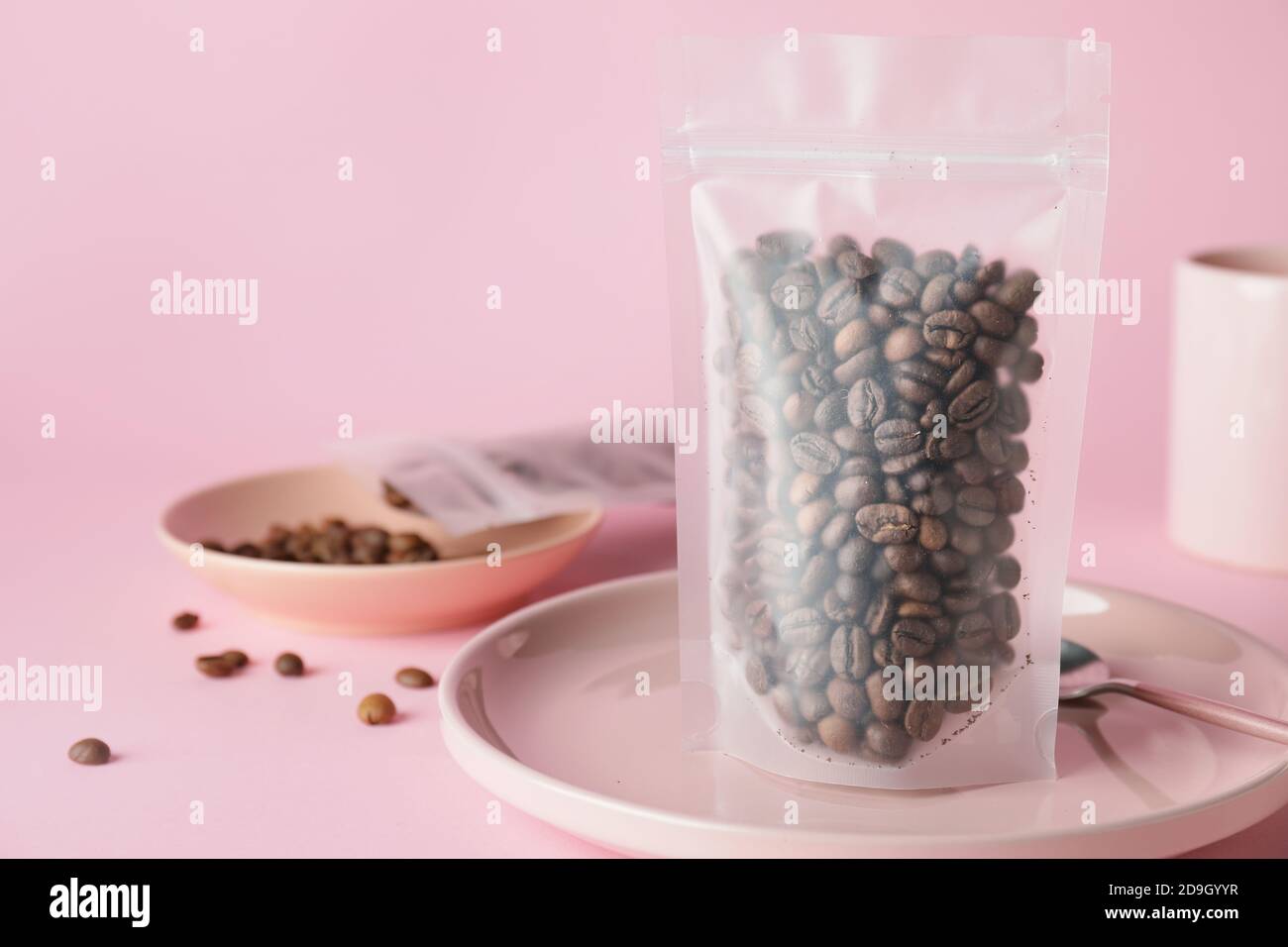 Blank coffee bag on color background Stock Photo - Alamy