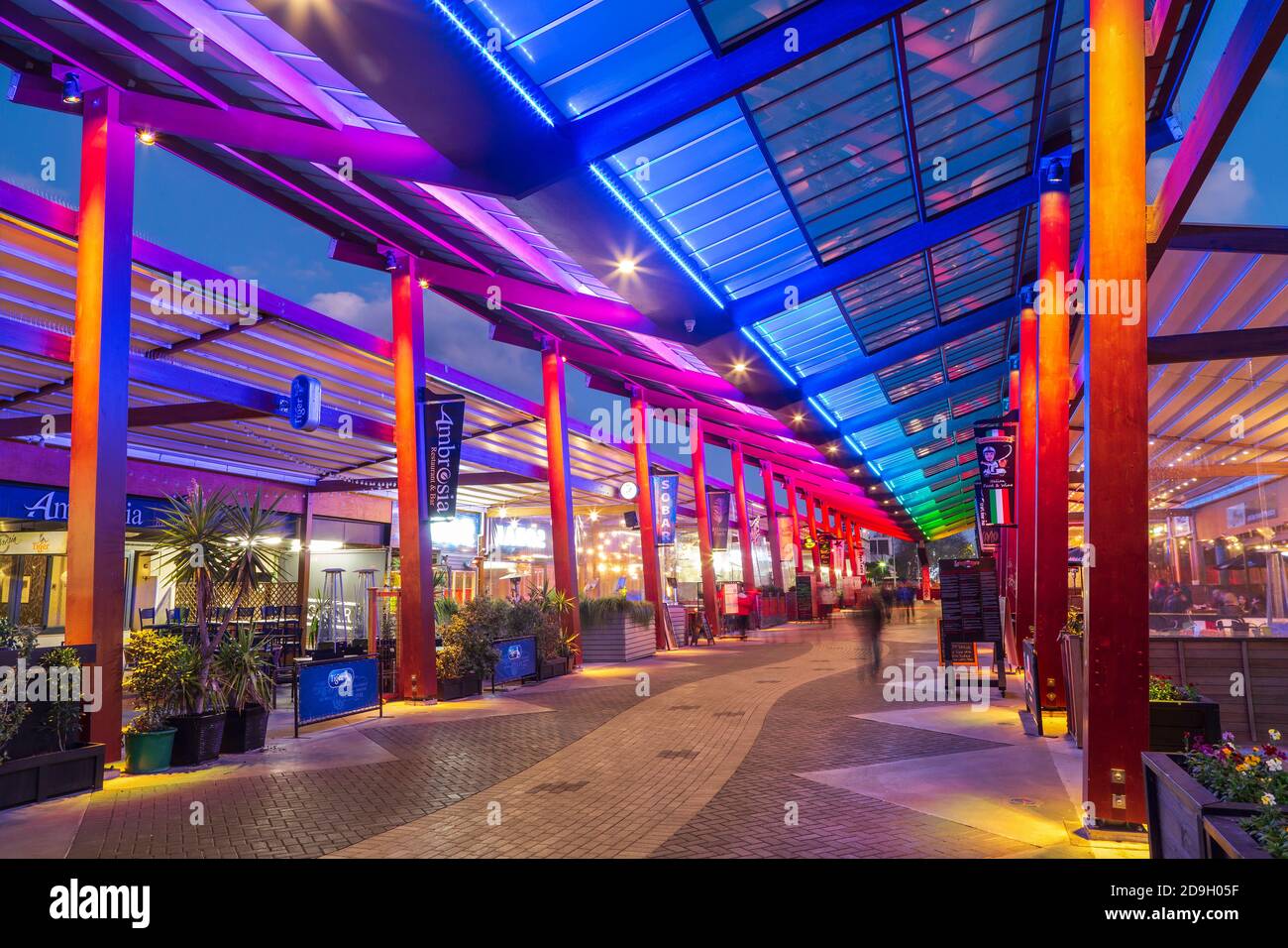'Eat Streat', a covered food court in Rotorua, New Zealand, with beautiful nighttime lighting Stock Photo