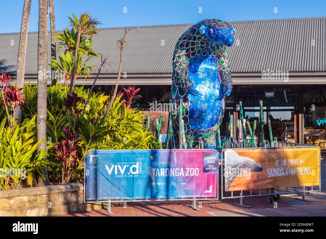 A colorful model of a pangolin (scaly anteater) on display at Taronga Zoo, Sydney, Australia, during the annual 'Vivid Sydney' festival Stock Photo