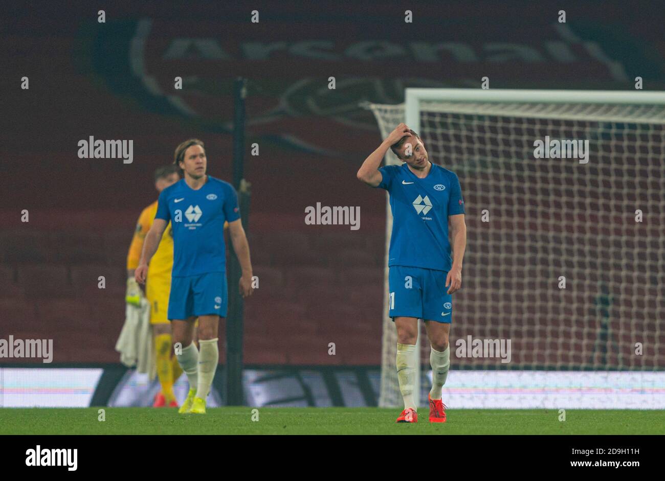 BUDAPEST, HUNGARY - SEPTEMBER 29: (l-r) Oleksandr Zubkov of Ferencvarosi TC  and Somalia of Ferencvarosi TC fights for the ball with Martin Ellingsen of  Molde FK during the UEFA Champions League Play-Offs