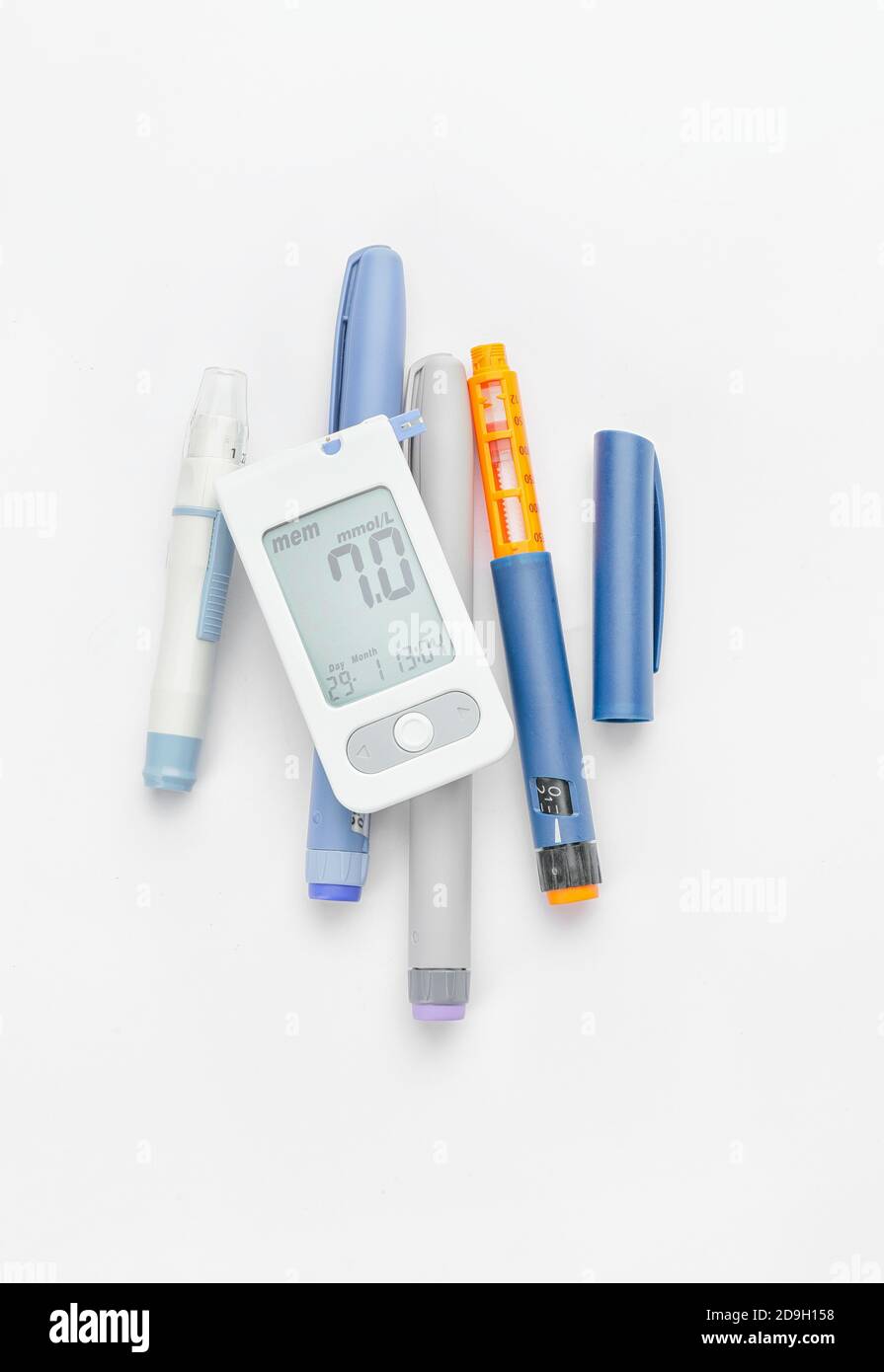 lancet pens and syringe on white background. Diabetes concept Stock Photo Alamy