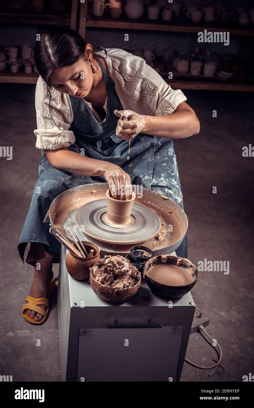 Womens hands working on pottery hi-res stock photography and images - Alamy