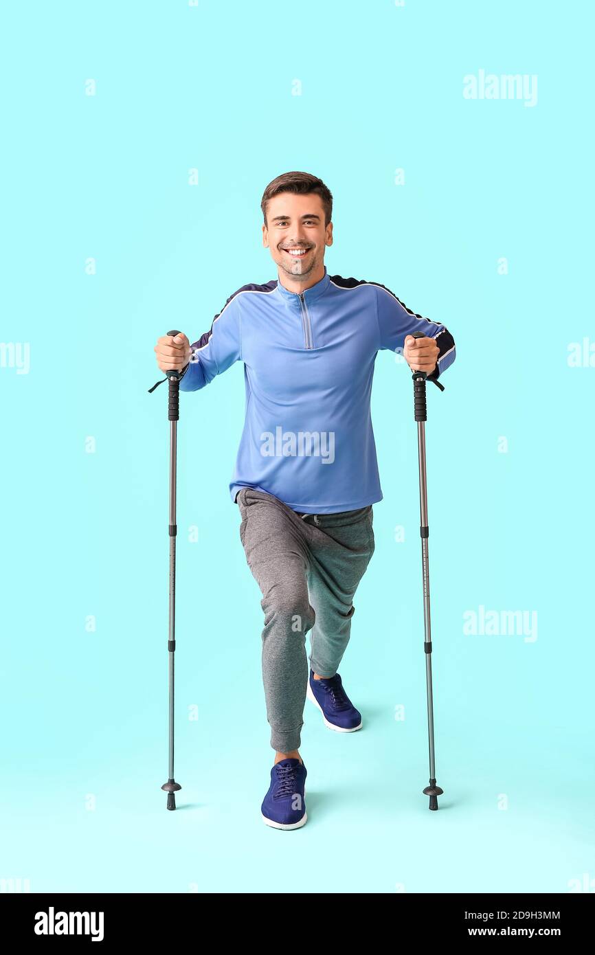 Young man climbing on ski hi-res stock photography and images - Alamy